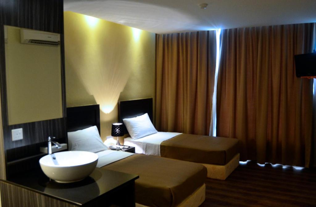 Zotel Business & Leisure Hotel Kuching Szoba fotó