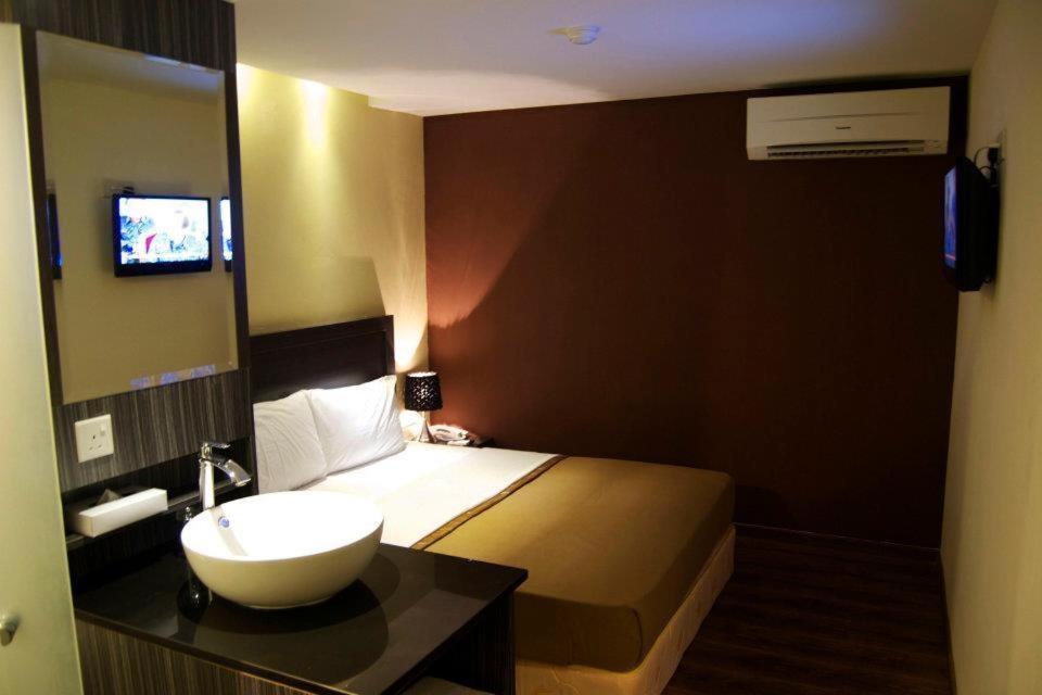 Zotel Business & Leisure Hotel Kuching Szoba fotó
